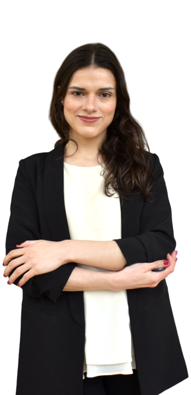 Inês wearing professional clothing and smiling